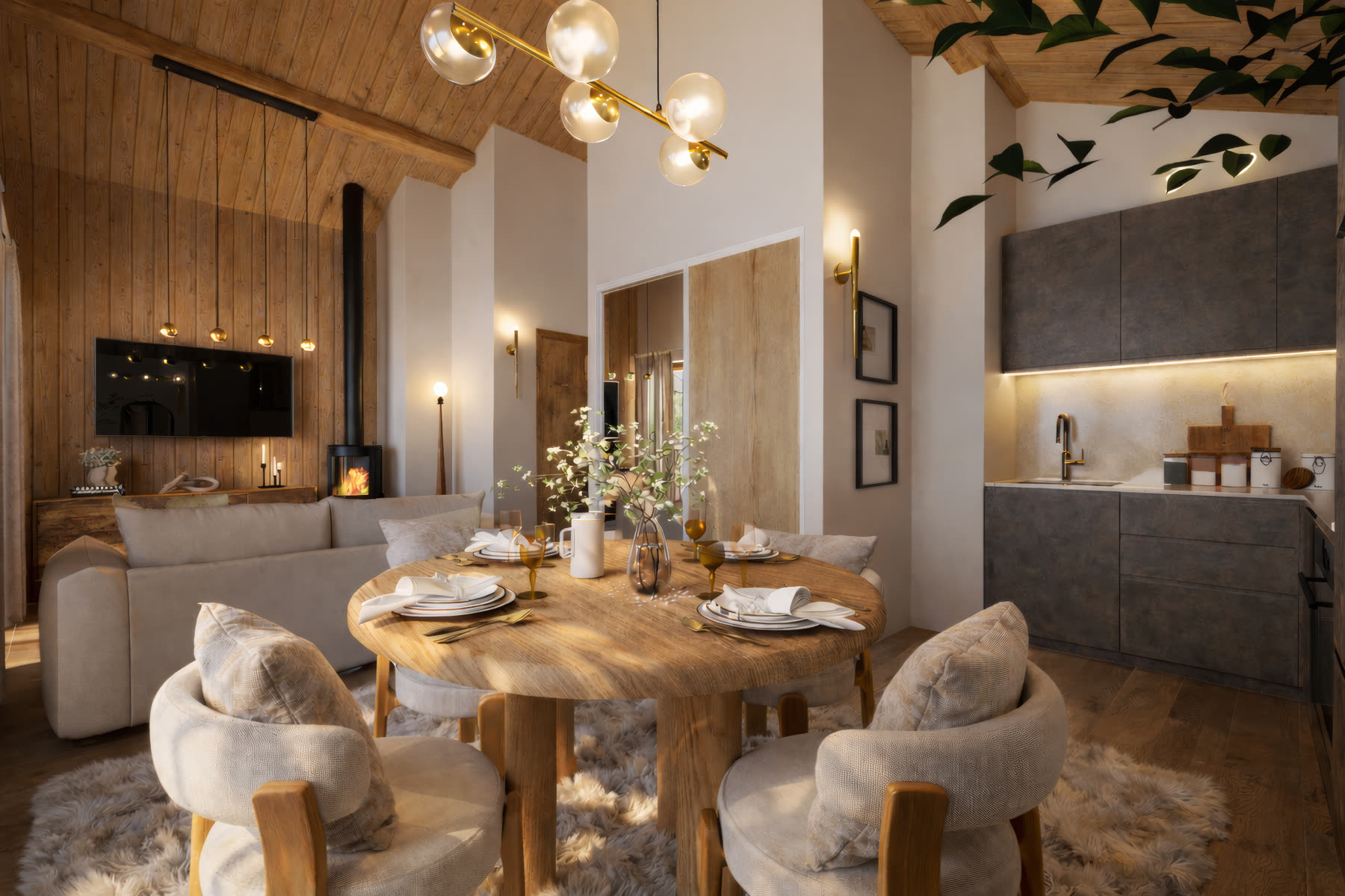 Coin repas en journée : table ronde en bois massif, fauteuils bouclette