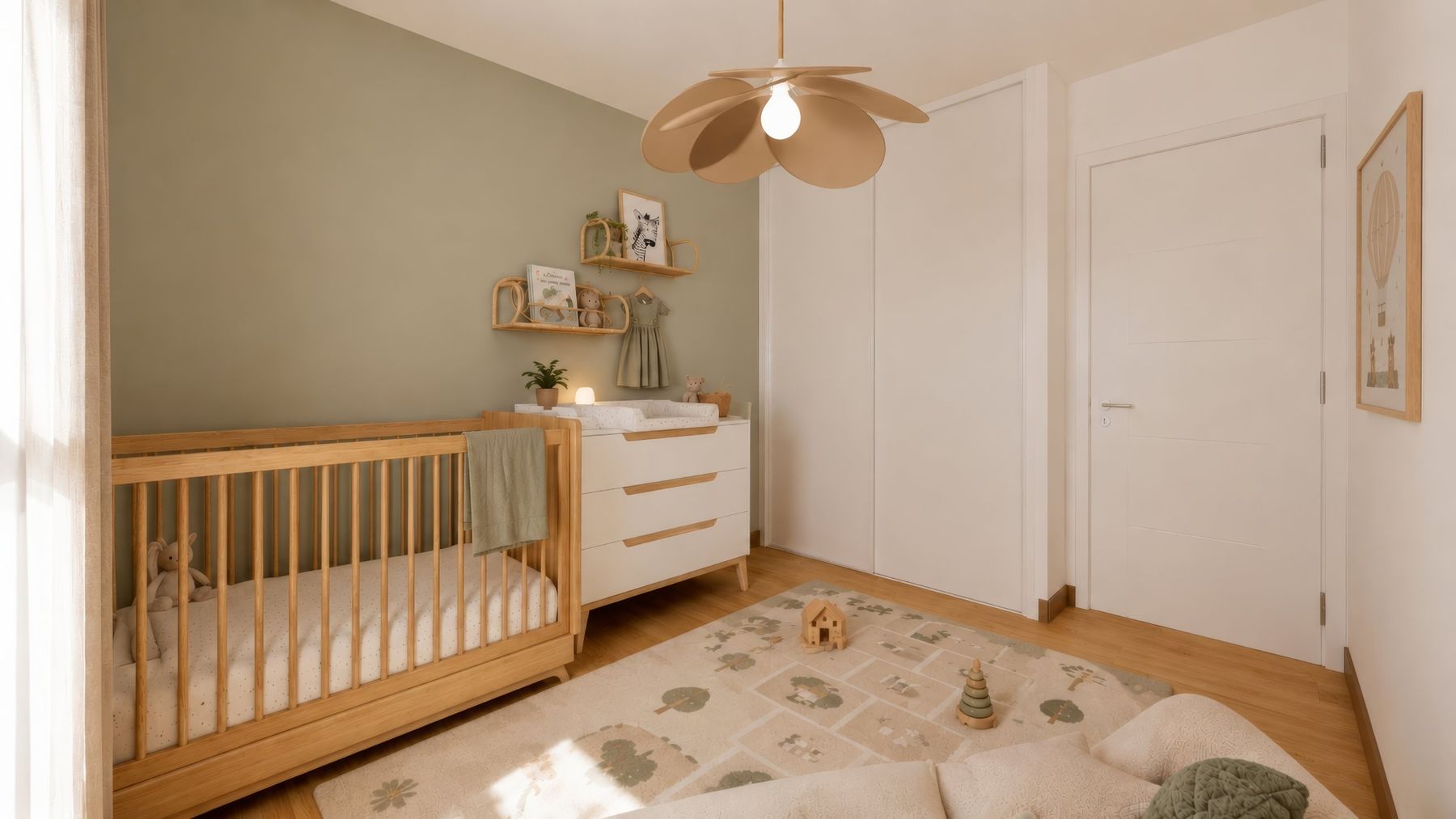Chambre de bébé vert sauge, lit à barreaux