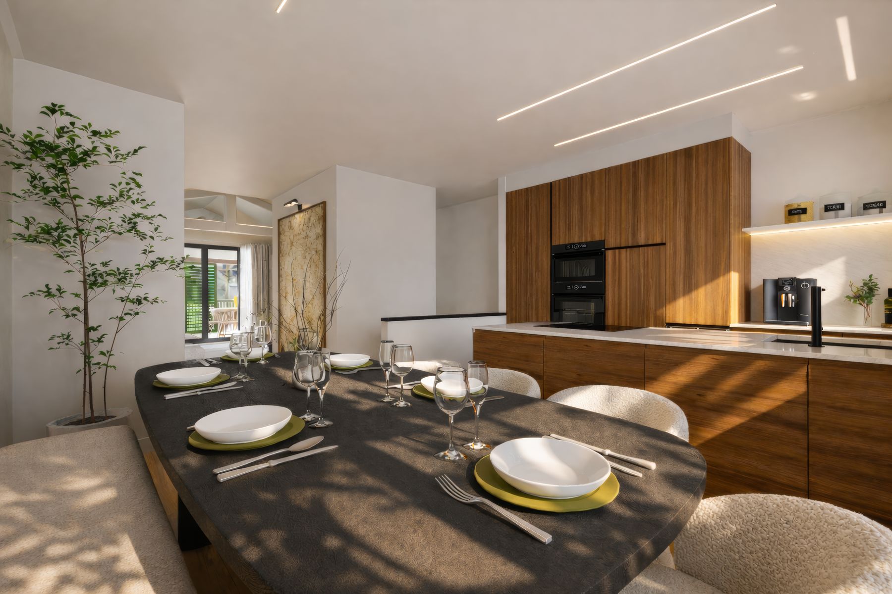 Salle à manger dressée face à la cuisine noyer